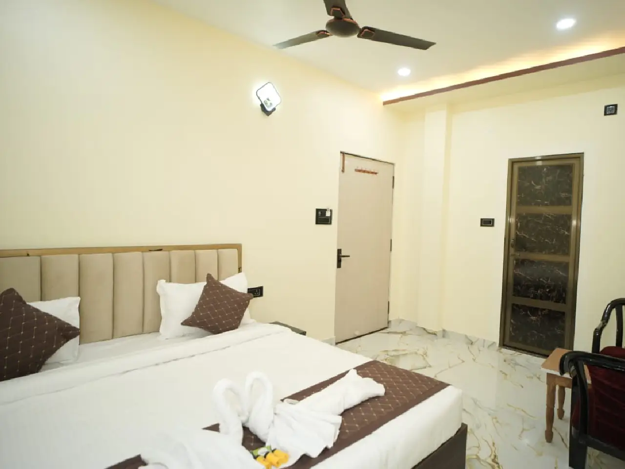 Bright standard room offering varanasi accommodation for family